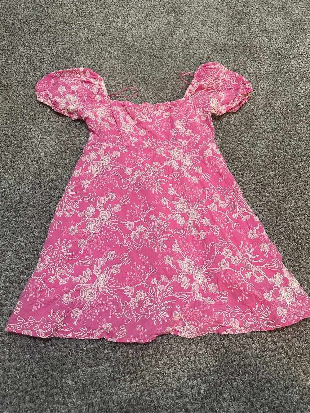 Pink and embroidered white floral mini dress